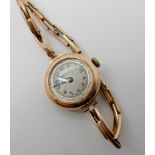 A 9ct gold ladies vintage watch weight including mechanism 19.4gms Condition Report: Available