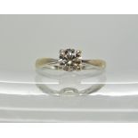 A 9ct white gold diamond solitaire ring, the diamond is estimated approx at 0.50cts, colour I/J, and