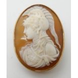 A 9ct gold mounted shell cameo brooch of a female warrior, 3.4cm, weight 6.6gms Condition Report: