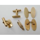 Two pairs of 9ct gold engine turned engraved cufflinks and a piece of another cufflink weight approx