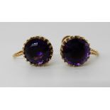 A pair of 9ct gold amethyst screw back earrings, diameter of the amethyst 9.2mm, weight 3.4gms