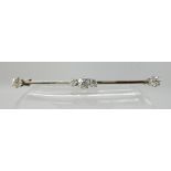 A white metal diamond set bar brooch of estimated approx 0.80cts, weight approx 2.9gms Condition