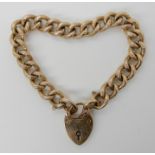 A 9ct gold curb link bracelet with heart shaped clasp length 19cm, weight approx 16.9gms Condition