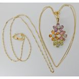 A 9ct gold mixed gem flower cluster pendant 4cm x 2.3cm with 9ct chain length 44cm, weight 5.5gms