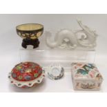 A Chinese hardstone bowl with white metal dragons mounts and wood stand, 11cm wide, two porcelain