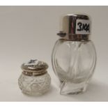 A silver topped moulded glass scent bottle by Cornelius Desormeaux Saunders and James Francis