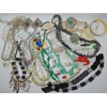 A bag full of vintage costume jewellery to include Max Neiger style Chinese themed bead necklace