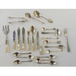 A lot comprising assorted EP spoons, forks, tongs etc, some with mother of pearl handles Condition