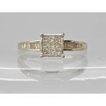 A 9ct gold princess and baguette diamond set ring, estimated approx 0.25cts, diamond content