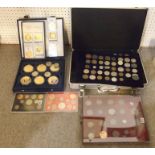 A lot comprising assorted pre-decimal British and foreign coins in a coin case, a cased set of