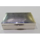 A silver box, Birmingham 1913, by Mappin & Webb, 2cm high x 8.5cm long x 5cm deep Condition