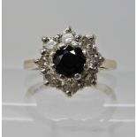 An 18ct white gold sapphire and diamond ring diamond content estimated approx 0.50cts, finger size