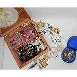 A decorative box full of silver and costume jewellery to include a silver agate set bangle, a John