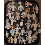 A collection of continental porcelain half dolls, largest 12cm high Condition Report: Available upon