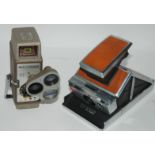 A Bell & Howell cine-camera, folding polaroid camera, hip flask etc Condition Report: Available upon