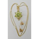 A 9ct gold peridot pendant 2.8cm and chain length 46cm and a pair of 9ct gold peridot stud earrings,