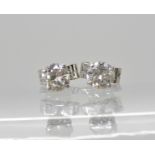 A pair of 9ct white gold diamond stud earrings of estimated approx 0.46cts, weight 0.6gms