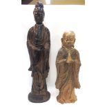 A Chinese cast metal figure of Guanyin, 60cm high and another figure of a Luohan, 46cm high (2)