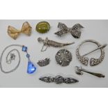 Silver Scottish themed brooches and other items Condition Report: Available upon request