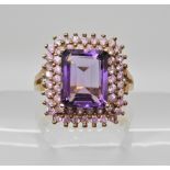 A 9ct gold amethyst and pink gem cluster ring, head size 19.9mm x 15.6mm, size O, weight 4.3gms