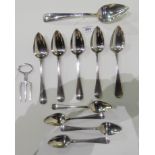 A lot comprising a continental silver basting spoon, five similar table spoons, four dessert