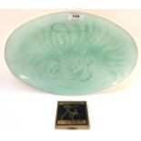 A vintage Coty glass oval shaped dish, 36cm wide and a lady's powder compact decorated with a female