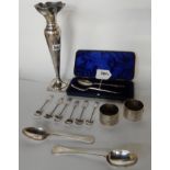 A lot comprising a silver vase, Sheffield 1913, a silver two piece christening set, Sheffield