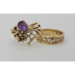 A 9ct gold retro amethyst set ring, size L and a 9ct gold full eternity ring set with clear gems,