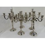 A set of five (3 + 2) white metal five-light candelabra, the tallest pair 37cm high Condition