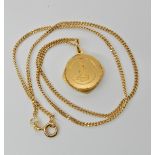A 14ct gold chain, length 40cm, weight 4gms with a gold plated silver SOS pendant Condition