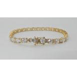 A 14k gold cubic zirconia line bracelet, by QVC, length 18.5cm, weight 13gms Condition Report: Light