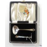 A cased silver spoon and pusher, Birmingham 1933 Condition Report: Available upon request