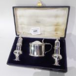 A cased three piece silver condiment set by Samuel Walton Smith, Birmingham 1922, 179gms Condition