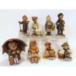 Eight Hummel figures including Umbrella Girl, Skier, Chick Girl, Goose Girl etc Condition Report: