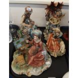 Four Capodimonte figures including a cobbler, a lady and dog, a lady painting and an old man under