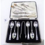 A lot comprising a cased set of six silver teaspoons with tongs, Sheffield 1941, 115gms with a