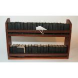 A collection of forty Shakespeare miniature books in bookcase Condition Report: Available upon