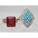 A 9ct ruby and diamond ring, ruby approx 11.8mm x 10.1mm x 7.1mm, finger size N together with a blue