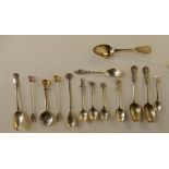 A lot comprising fourteen assorted silver spoons and pickle forks, various marks, 175gms Condition