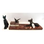 A French Art Deco marble and spelter Alsatian dog and bird sculpture, 34cm long, together with a