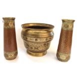 A pair of Indian Benares brass vases, 22cm high and a jardiniere, 17.5cm high (3) Condition