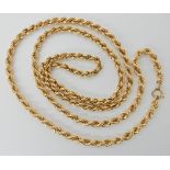 An 18ct gold rope chain with a 9ct gold clasp, length 82cm, weight 26.6gms Condition Report: Apart