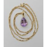 A 9ct gold QVC amethyst and diamond pendant clasp, dimensions 2.6cm x 1.3cm, together with a 9ct