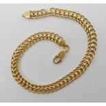 An 18ct gold Italian made fancy link bracelet, length 20.5cm, weight 6.4gms Condition Report: One