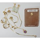 A collection of 9ct gold and yellow metal items to include 9ct chain, earrings and amethyst