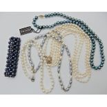 A string of Honora teal coloured pearls and a collection of others Condition Report: Available