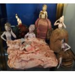 A collection of porcelain half dolls, mostly made up as pin cushions (7) Condition Report: Available