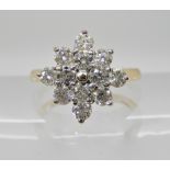 A 9ct gold diamond star cluster ring of estimated approx 1ct in total, finger size L1/2, weight 2.