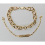 A 10k gold fancy link bracelet, approx 18cm together with a 14k gold child's bracelet length 14cm,