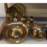 Assorted brass ware including 20th Century alms style dishes, Chinese tazza, Thai bell etc Condition